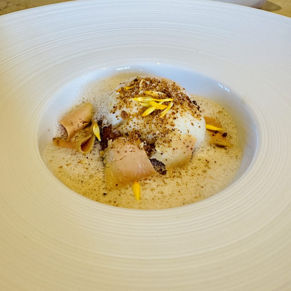 Slow-cooked egg, broth and shavings
