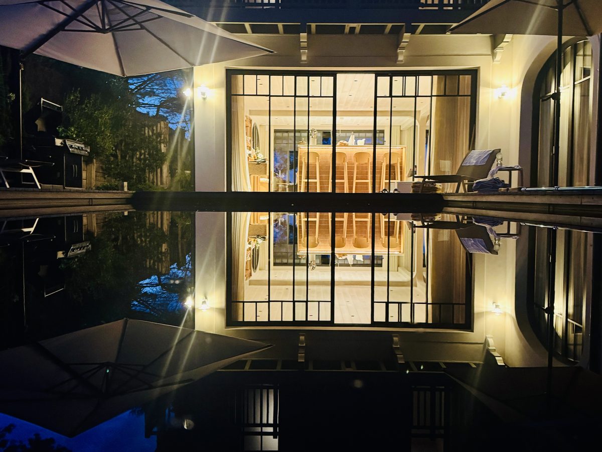 A villa by the pool in the evening